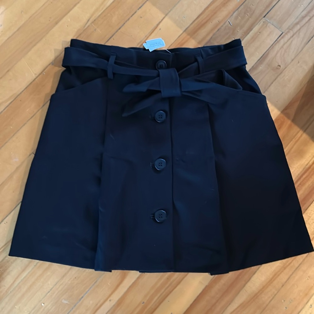 NWT. Cloth by design black pleated mini skirt. Size small.Brailey button skirt.